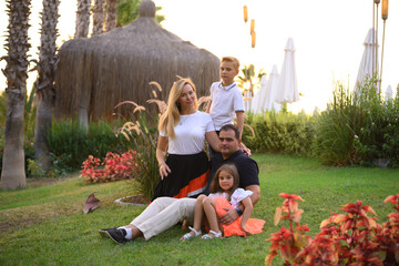 A happy family with kids in the park