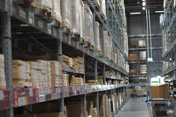 Fototapeta premium Storage of goods in the warehouse. Warehouse in a shopping center.