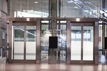 Modern elevator cabins in a business