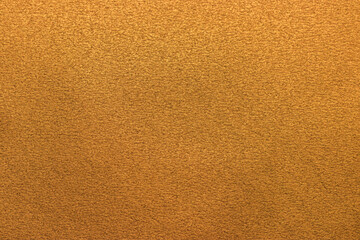 Soft gold background texture, subtle textured golden paper