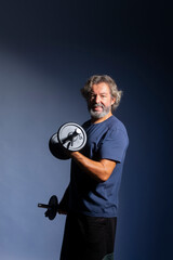 Grey haired man. Senior fitness.