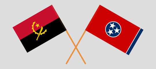 Crossed flags of Angola and the State of Tennessee. Official colors. Correct proportion