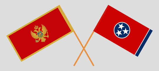 Crossed flags of Montenegro and the State of Tennessee. Official colors. Correct proportion