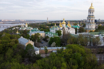 Fototapeta na wymiar Church in the European city of Kiev - Kiev-Pechersk Lavra. Summer drone shooting