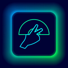 Glowing neon line Female hand with open fan flamenco accessory icon isolated on black background. Colorful outline concept. Vector