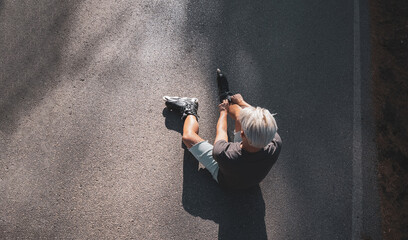 a young gay man skating on in-line skates.
