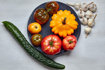 Fresh organic vegetables on a white background. Healthy food concept