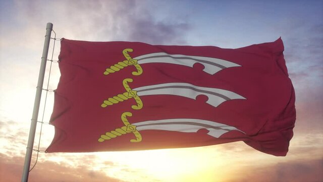 Essex flag, England, waving in the wind, sky and sun background