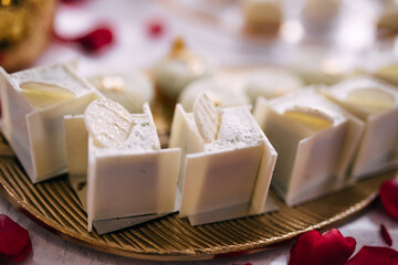 Candy bar with sweet desserts at the wedding buffet