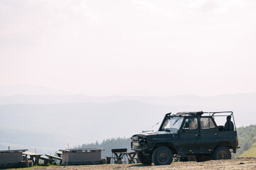 SUV mountain road. Tourist food car. Expedition along the summer route. rural nature landscape