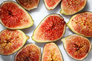 A slice of delicious figs on a plate. Top view.