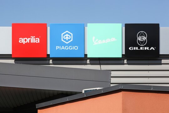 Gleize, France - June 14, 2020: Facade of a dealership with different scooters and motorcycles brands in the world