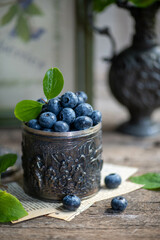 fresh blueberries with green leaves
