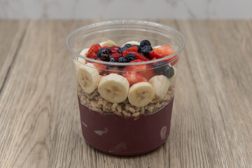 Acai fruit bowl blueberries, strawberry, and agave with blended flavors to increase your immunity and better nutrition
