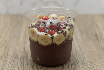Acai fruit bowl coconut, cacao, and granola with blended flavors to increase your immunity and better nutrition