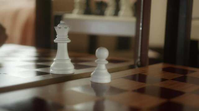 Narcissistic pawn who thinks he is a queen, human metaphor self-conceit complex chessboard