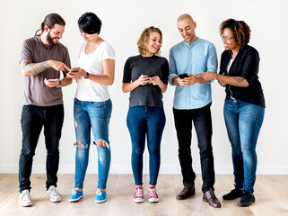 Group of people using mobile phone