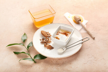 Different natural ingredients for homemade cosmetics on color background