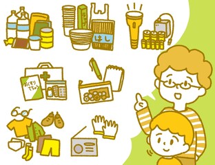 防災セットの中身を確認する父親と息子