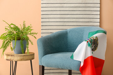 Interior of stylish living room with Mexican flag