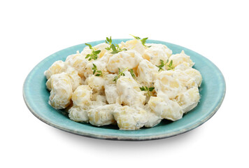 Plate of delicious gnocchi with creamy sauce on white background