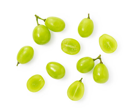 Grains of shine muscat grapes and cut shine muscat grapes on a white background.