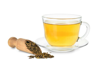 Scoop with dry hojicha green tea and cup of hot beverage on white background