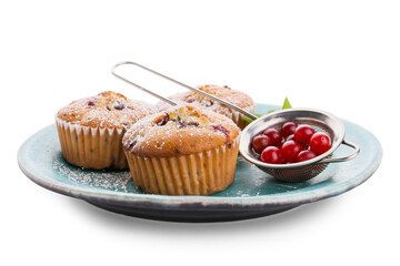 Plate with tasty cranberry muffins on white background