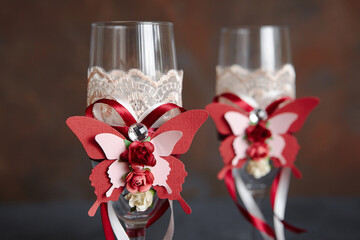 Handmade wedding accessories decorated with paper butterflies