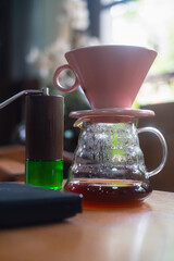 Pour over Coffee Dripper  on the wooden table