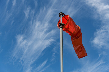 Wind Sock with Wispy Cloud Background