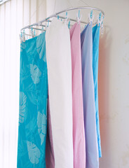 Blankets, pillowcases, sheets are drying out. Hang on the clip, hang the cloth. indoors laundry