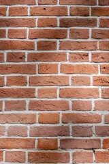 Fragment of a 18th century brick wall. Vintage bricks.