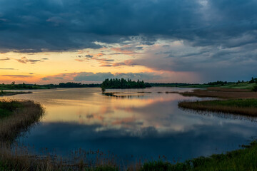 Summer evening on the lake in the Pskov region, Russia