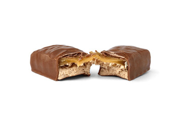 Broken chocolate bar with nougat and caramel isolated on white background.