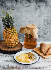 ingredients for Tepache Mexican fermented beverage made with pineapple, panela and cinnamon traditional in Mexico city