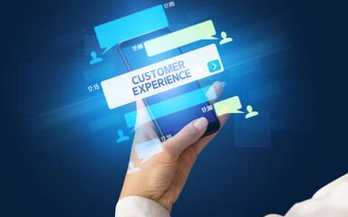 Hand using smartphone with social media concept