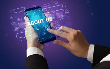 Hand using smartphone with social media concept