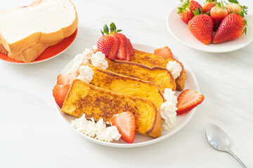 french toast with fresh strawberry and whipping cream