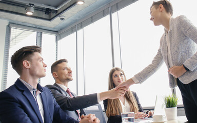 Job applicant having interview. Handshake while job interviewing
