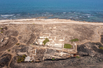 Fototapeta premium Tel Shikmona ancient ruins archeology site, Aerial view. 