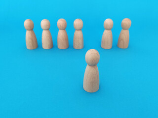 Human resources and management concept, wooden business people on blue background