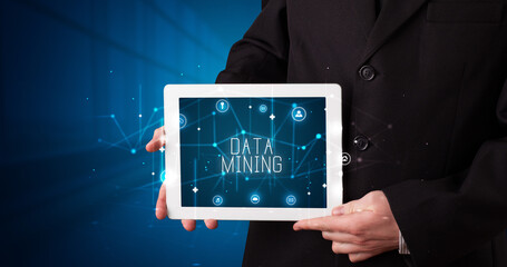 Person holding tablet, security concept