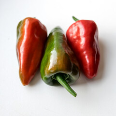 colored peppers on a light background