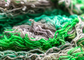 colorful, variegated, bright wool yarn fragments, knitting and handicraft concept