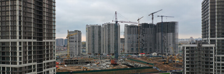 Fototapeta na wymiar Construction of residential area in city closeup