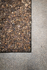 Top view garden stone walkway and Exposed Aggregate concrete background 