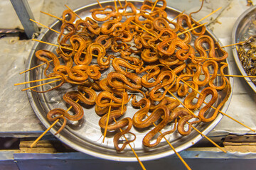grilled snakes on sale for food market in China
