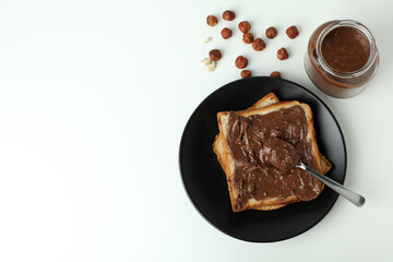 Concept of delicious food with chocolate paste on white background