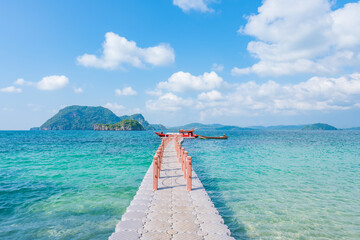Beautiful tropical beach sea and sand with floating walkway pontoon in Andaman Sea Thailand